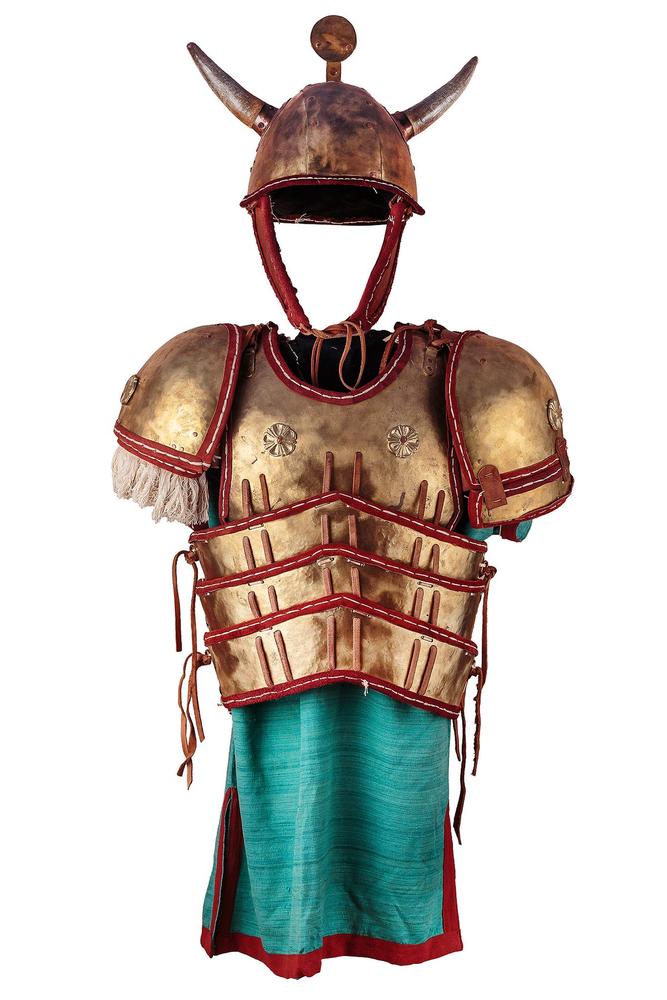 Reconstructed crested helmet and segmented bronze cuirass with teal tunic