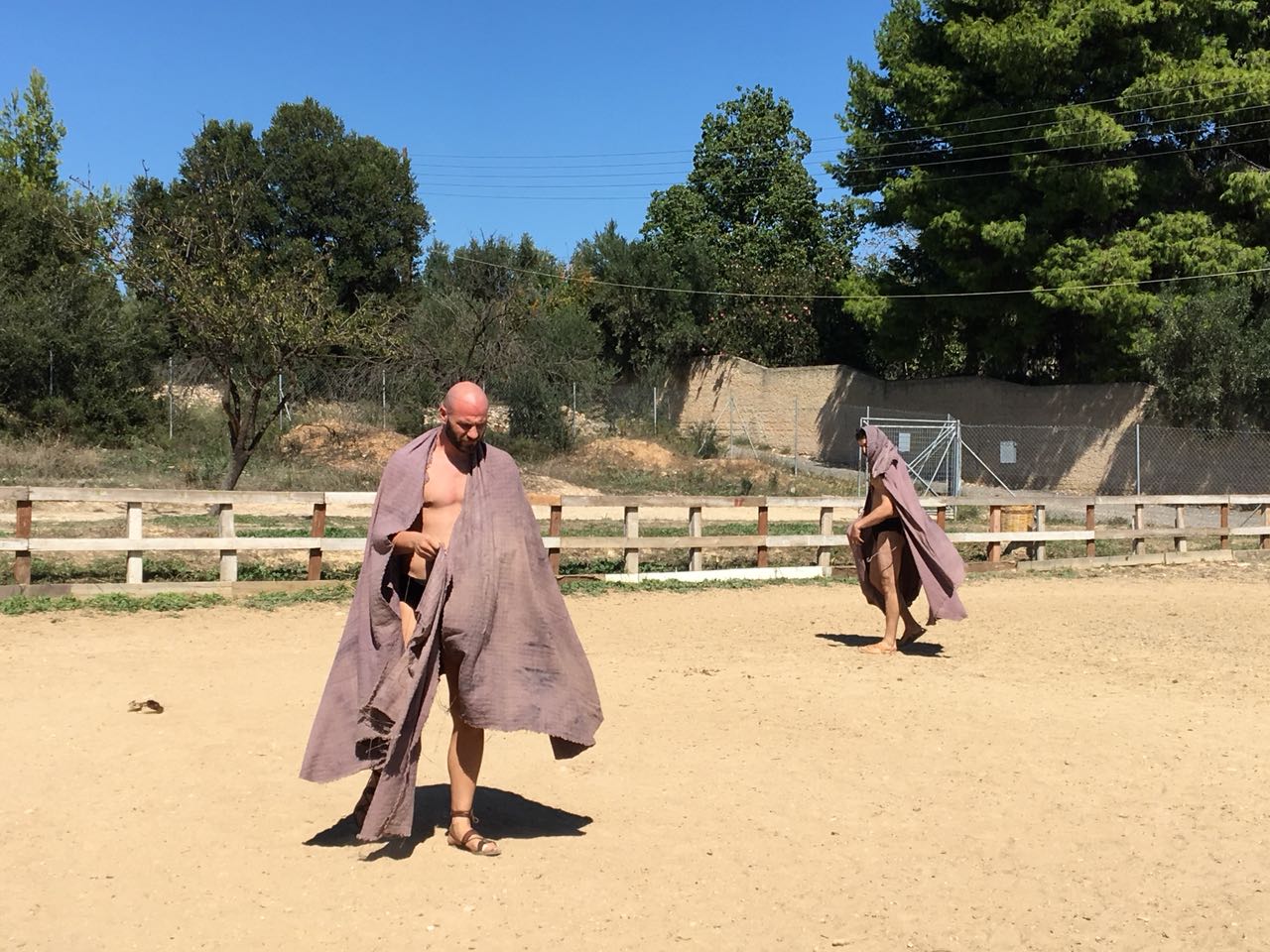 Historical interpreters entering the open athletic arena before a physical-culture presentation
