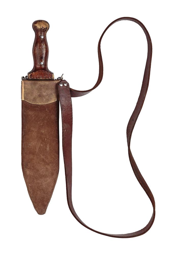 Reconstructed short blade in a plain brown sheath with shoulder cord