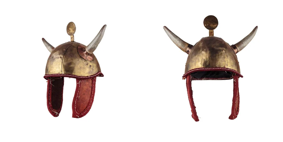 Two views of Mycenaean Helmet A, showing its bronze-coloured shell, horns, crest fitting and long red cheek guards
