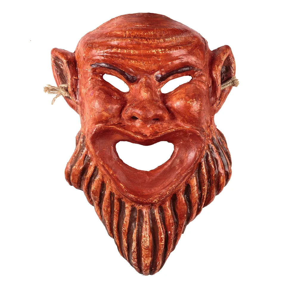 Red theatrical mask with pointed ears, sculpted beard and open mouth