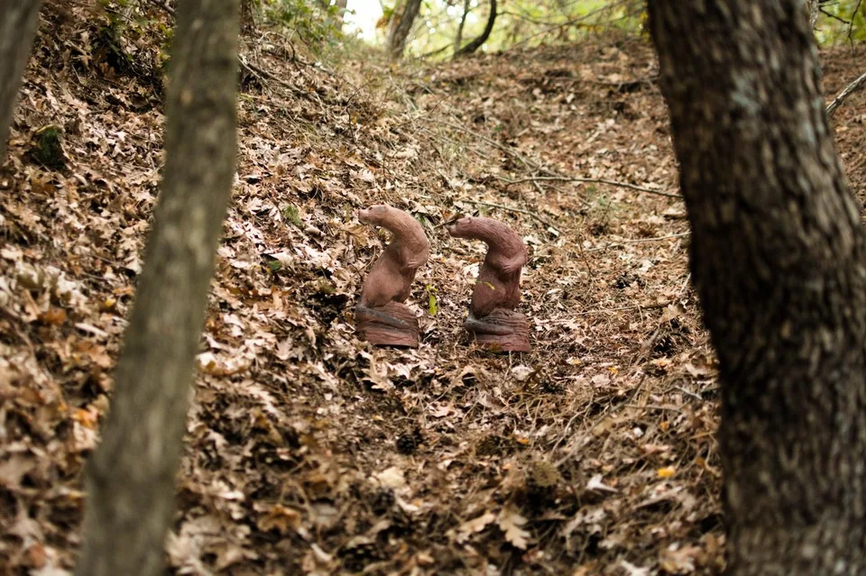 Pair of small woodland animals-shaped 3D archery target in a woodland course, woodland setting