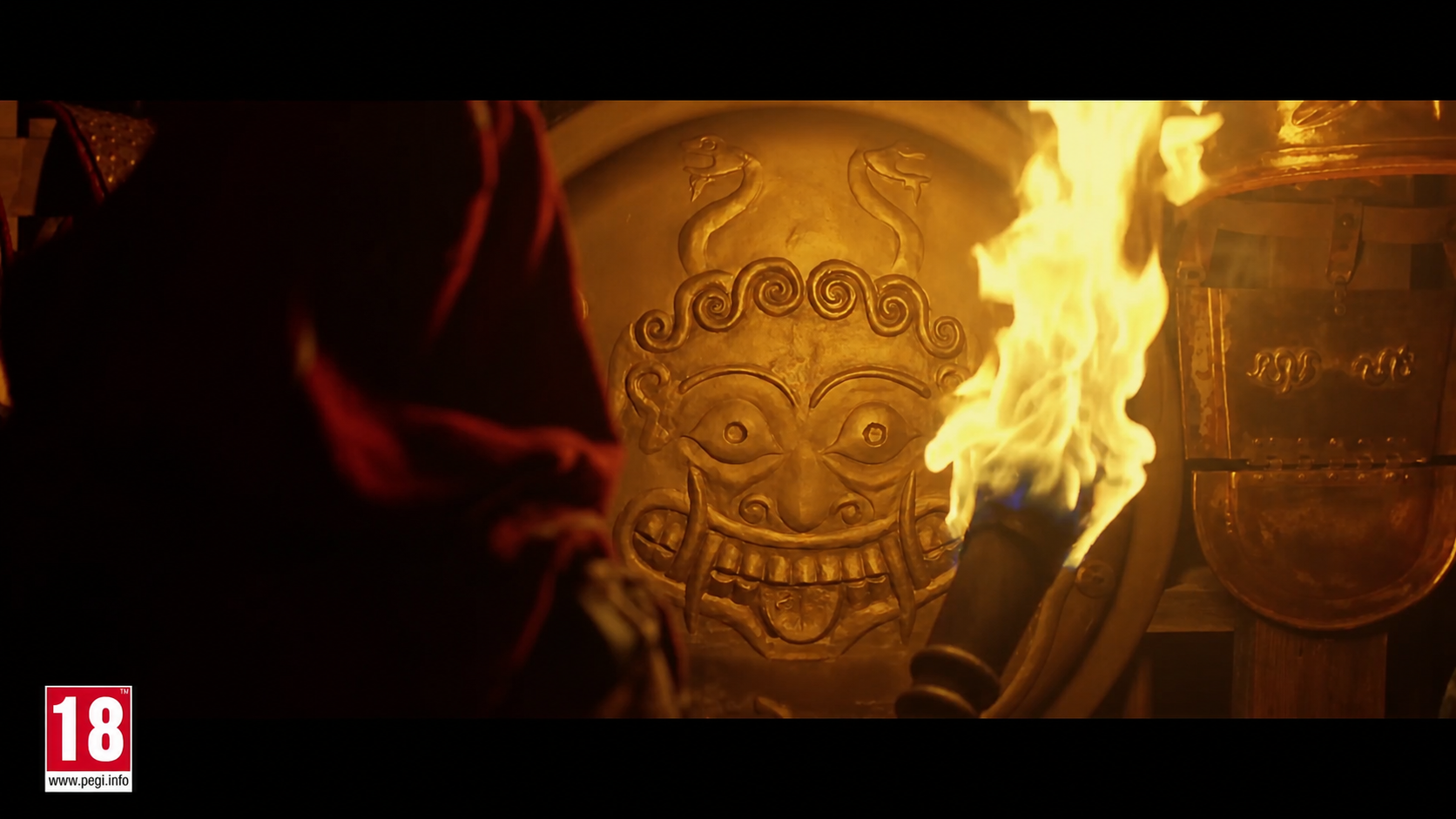 Assassin’s Creed Odyssey Choose Life trailer · Gorgon shield detail Gorgon-faced shield illuminated by fire in the Assassin’s Creed Odyssey Choose Life live-action trailer
