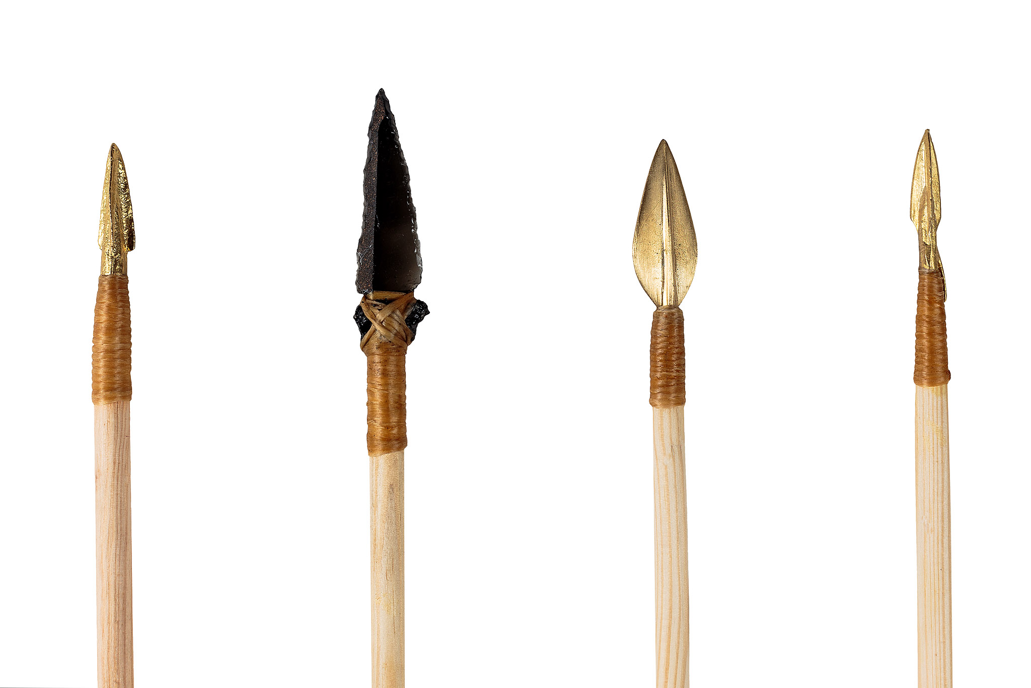 Reconstructed arrowhead forms | Archaeopolis Archery Games Close study of reconstructed arrowheads mounted on wooden shafts