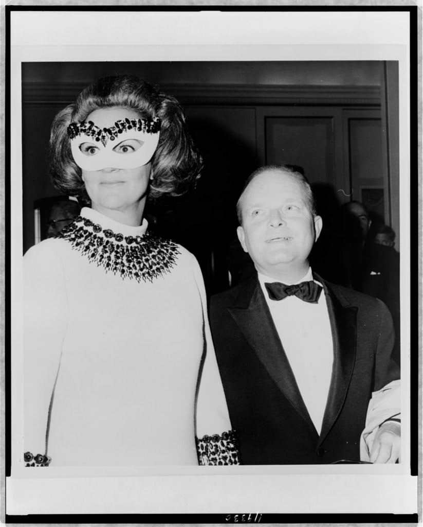 Truman Capote and Katharine Graham enter the Black and White Ball Truman Capote wearing a mask and entering the 1966 Black and White Ball with Katharine Graham