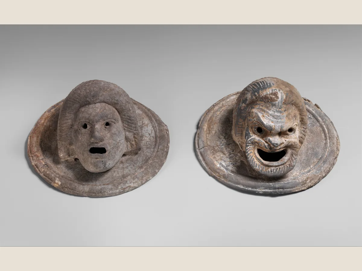 Hellenistic Greek terracotta roundels modelled as theatrical masks
