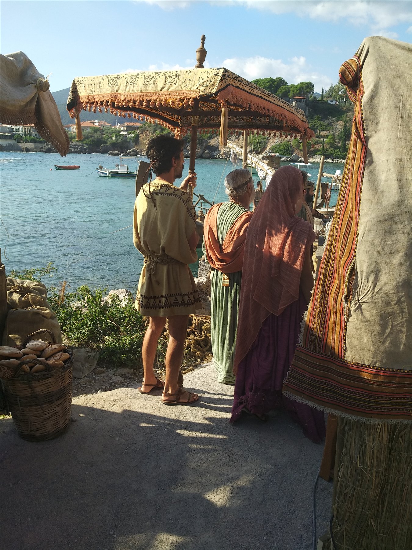 Assassin's Creed Odyssey Harbour Production Staging Performers in period costume beside a harbour during Assassin's Creed Odyssey filming in Greece