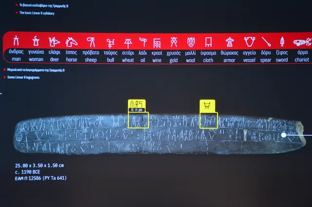 Exhibition panel showing Linear B ideograms, their meanings and an inscribed tablet.