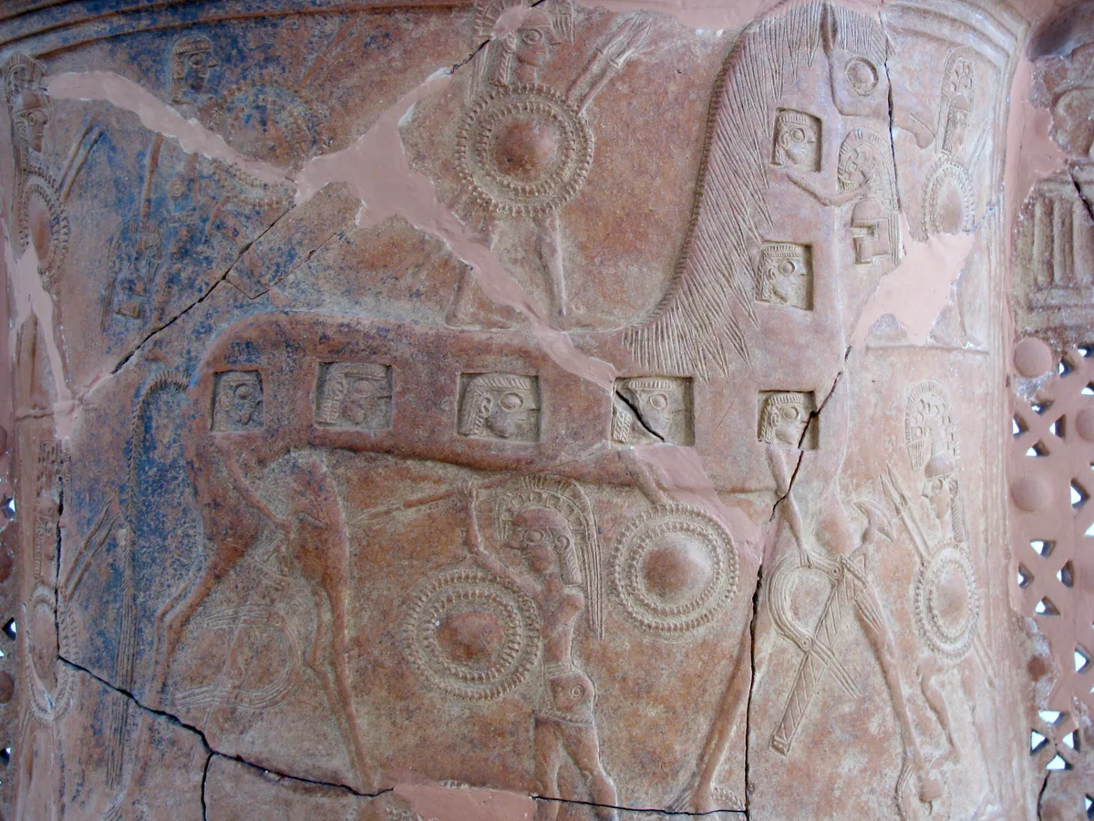 The Trojan Horse on the Mykonos pithos Relief of the Trojan Horse with warriors visible through openings in its body on a clay pithos