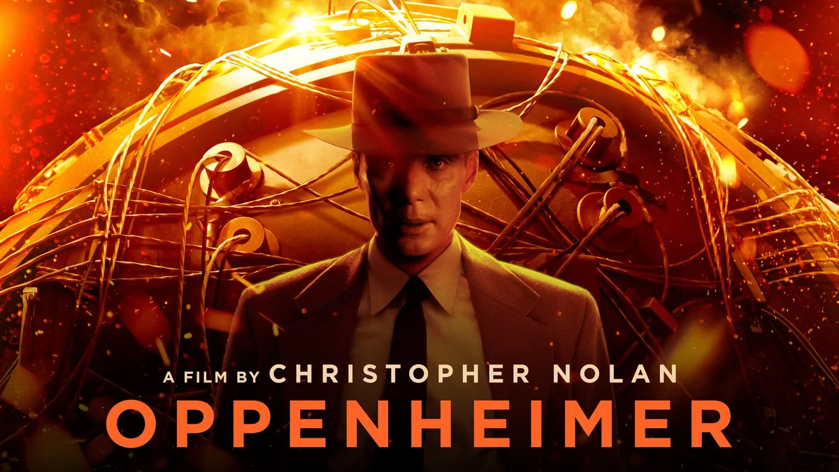 Oppenheimer (2023) Oppenheimer standing before a fiery orange background in the film’s official key art