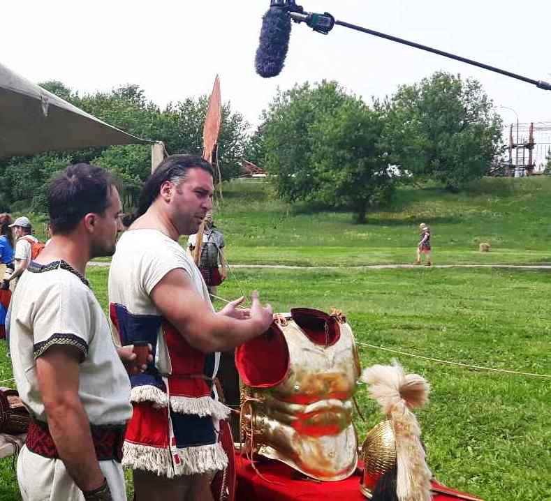Georgios Katsos discussing reconstructed armour during filming at the Times and Epochs festival in Moscow
