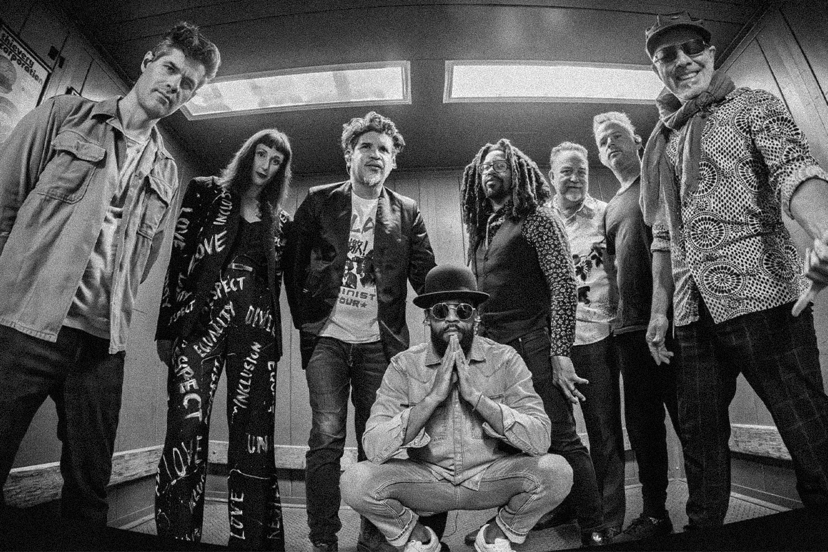 Official black-and-white group portrait of Thievery Corporation