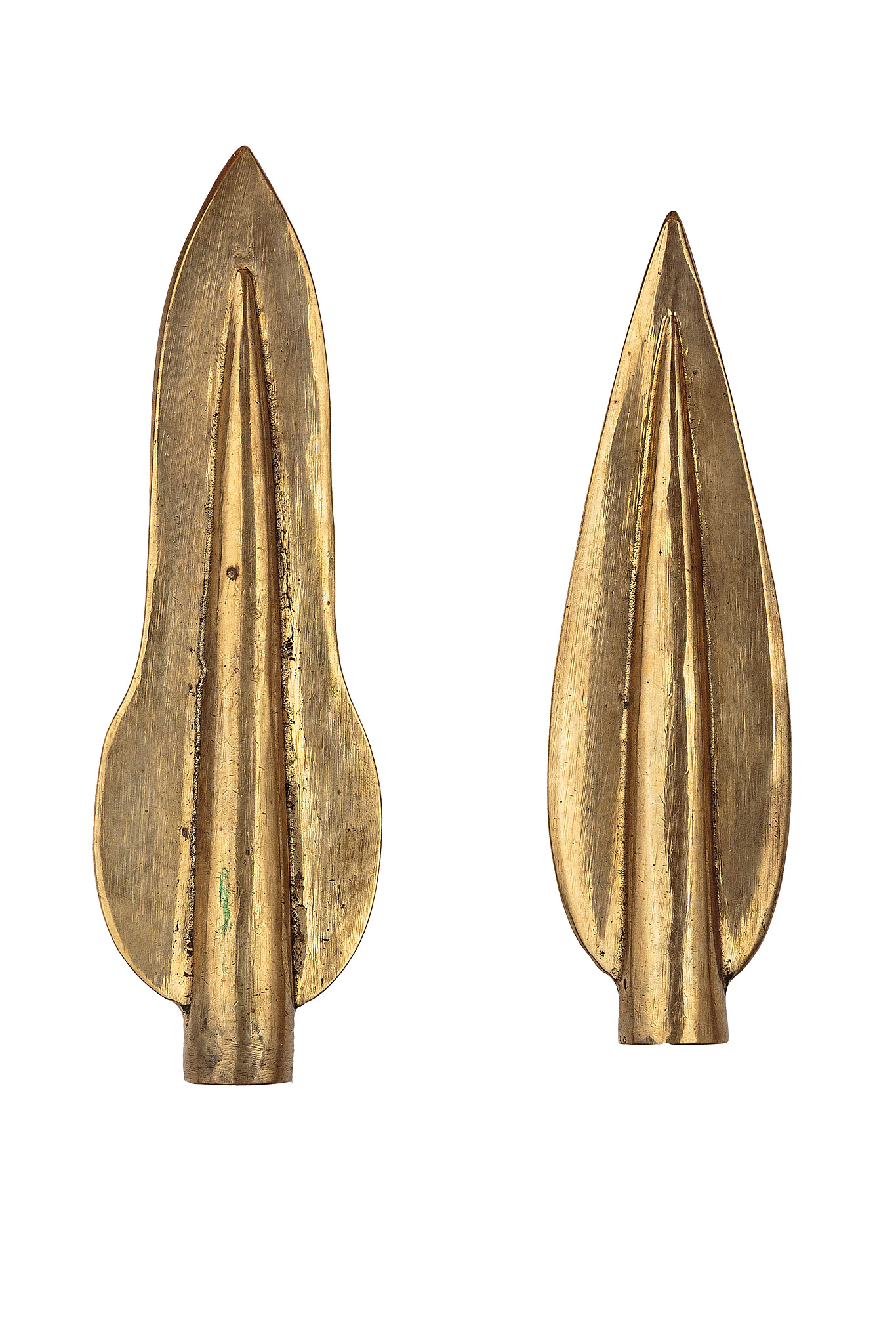 A larger spearhead shown beside the smaller arrowhead identified by the collection owner, Archaeopolis Objects archive
