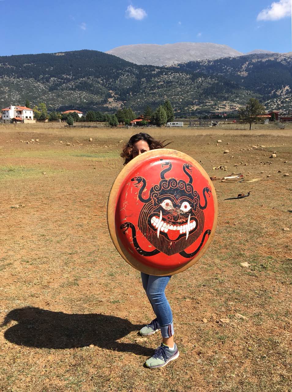 Participant holding a red Gorgon shield