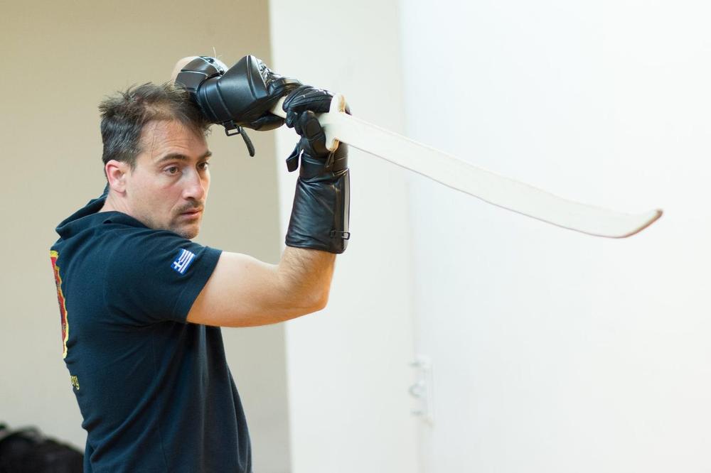 Curved Blade Guard | Athens Hoplites Project Instructor demonstrating a guard with a curved training blade