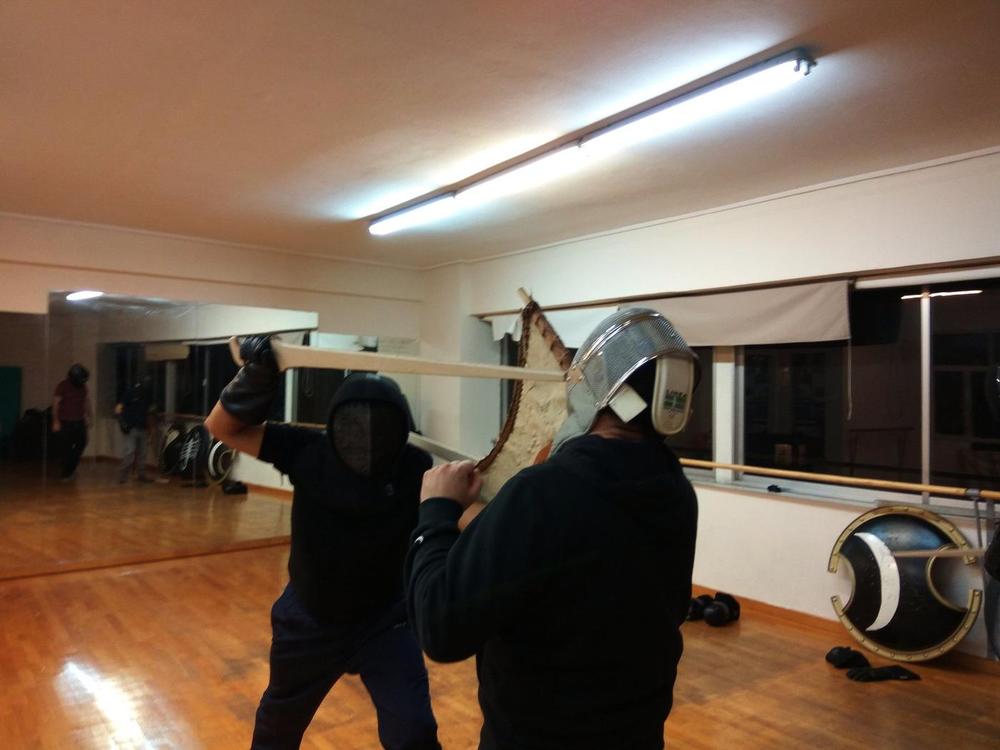 Helmet Shield Sparring | Athens Hoplites Project Protective sword-and-shield sparring during an Athens Hoplites class