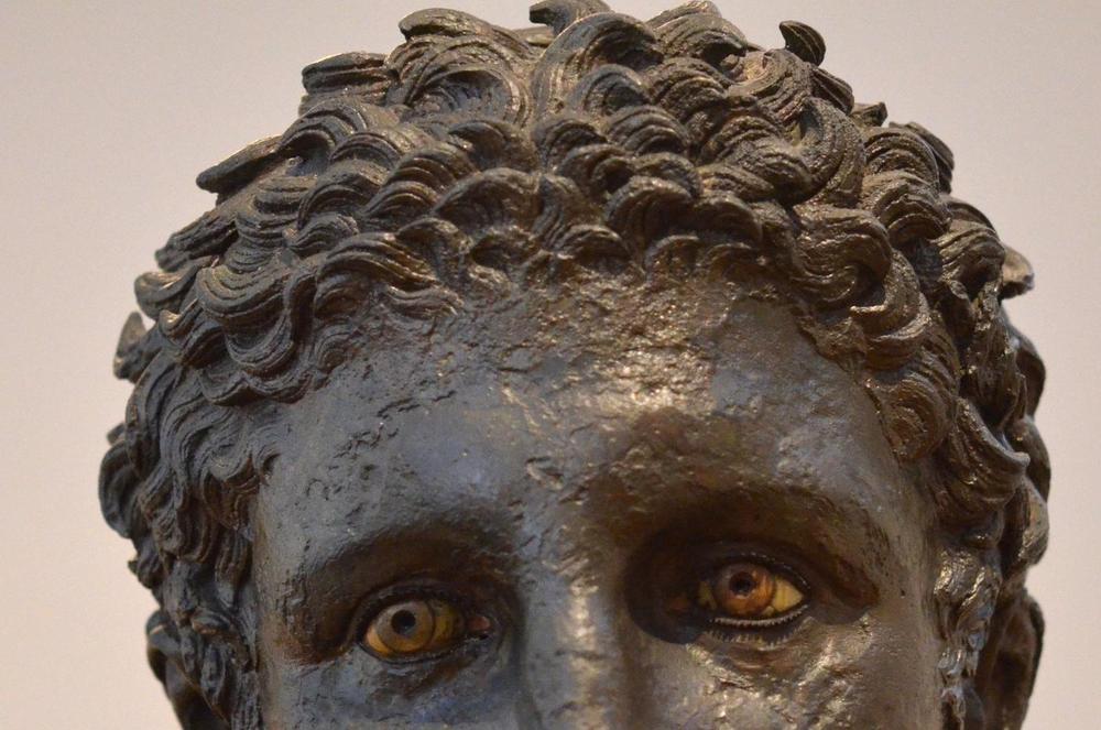 Bronze Statue Head | Athens Hoplites Project Close view of an ancient bronze statue head used for anatomical research