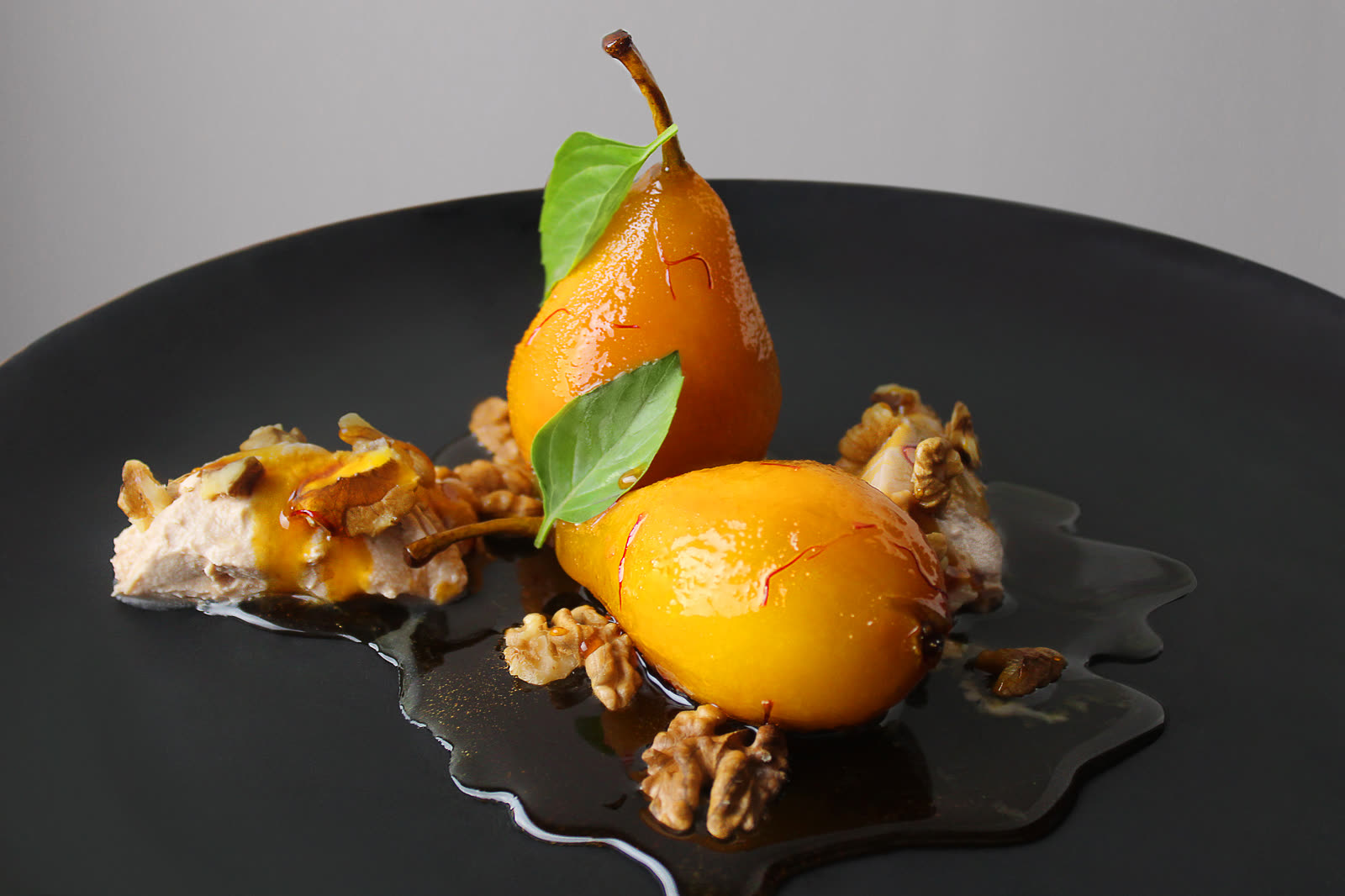 Poached pears with walnuts from the mythology-inspired Mykonos event menu
