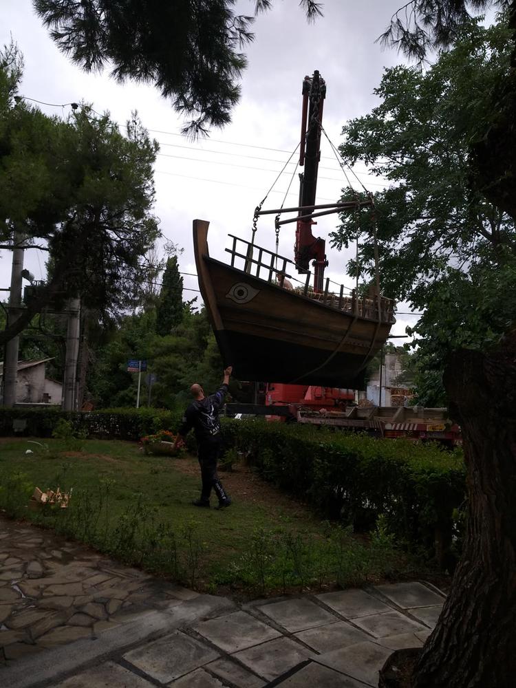 Lifting the Hull | Archaeopolis Olkas Ship Crane lifting the Olkas ship during installation and relocation
