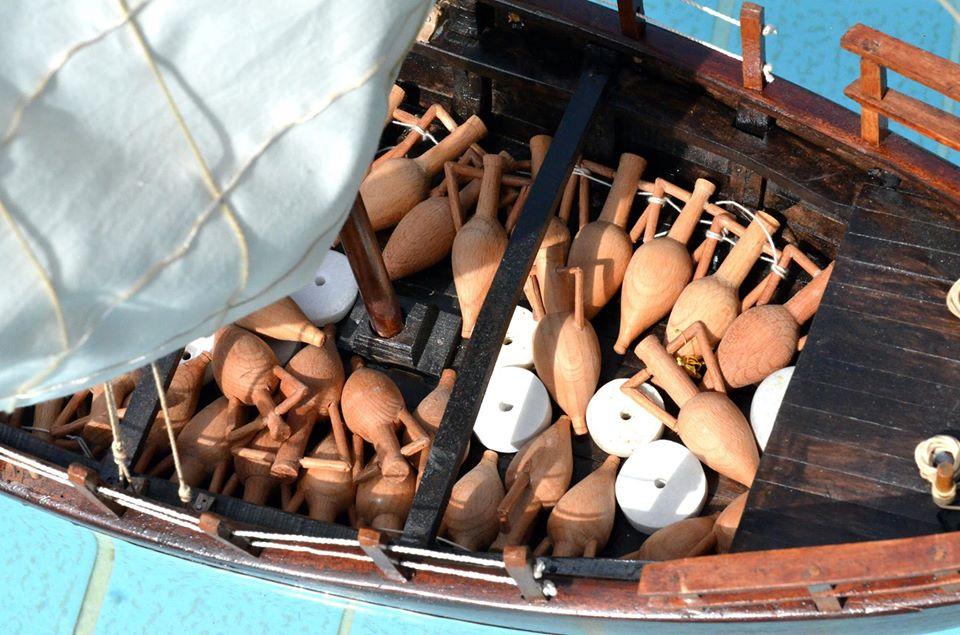 Amphora Cargo on the Kyrenia Ship | Maritime Archaeology Reference Close view of a Kyrenia ship research model with amphora cargo, mast, sail and deck arrangement