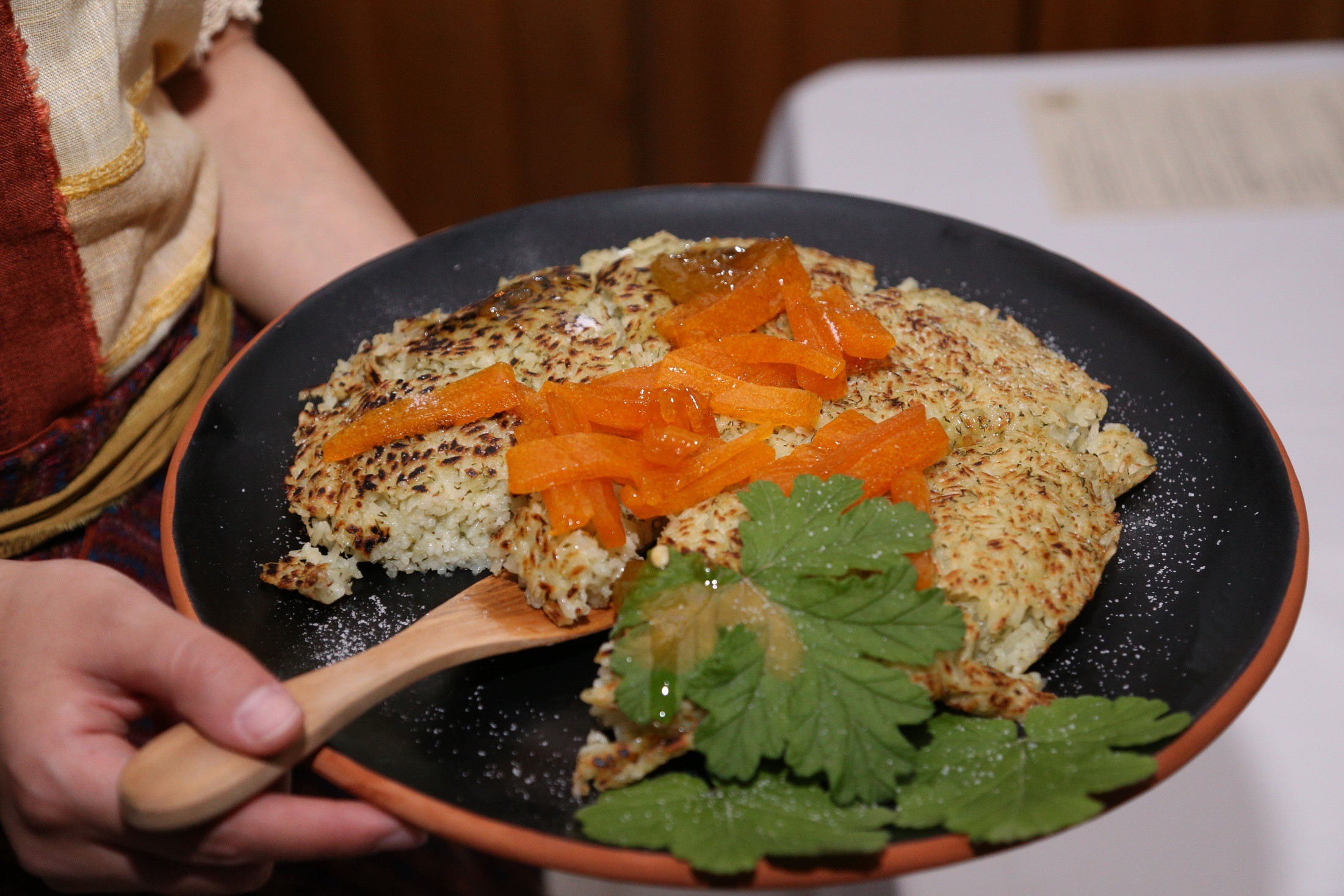 Historically inspired plated dish used as a gastronomy reference for the Seikilos Symposium
