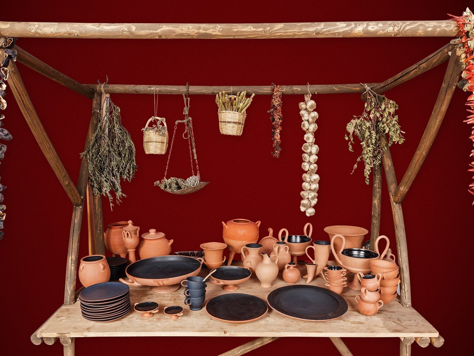 Historical tableware and hanging objects arranged as a symposium environment reference