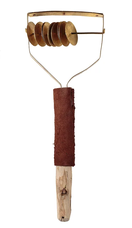 Sistrum with an angular metal frame, a row of loose discs and a wrapped wooden handle
