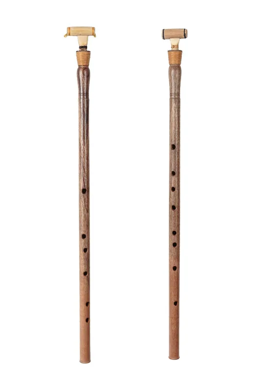 Pair of brown wooden aulos pipes with finger holes and wrapped mouthpieces