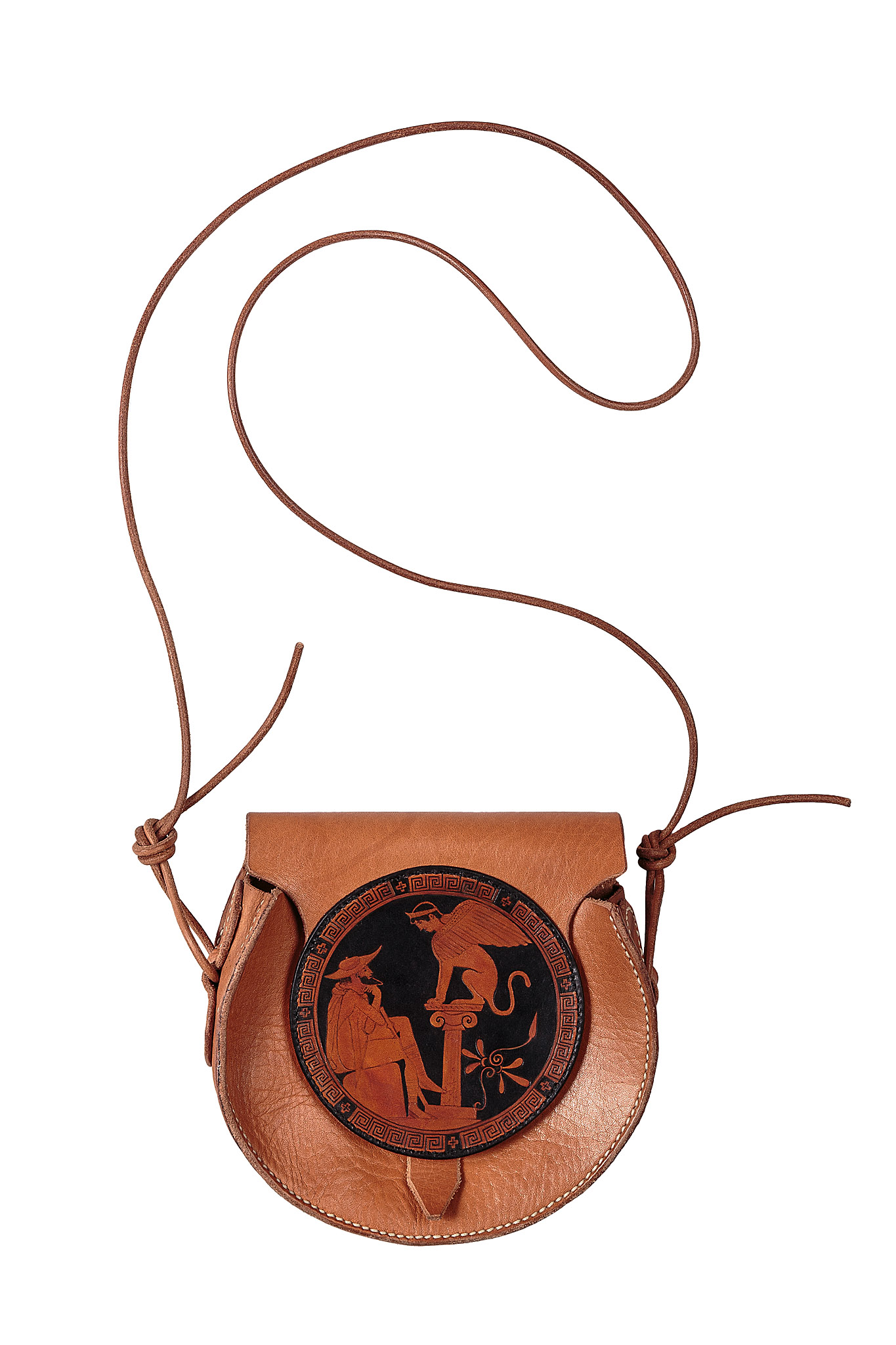 Brown leather shoulder bag with a circular red and black design showing a seated figure and a winged sphinx