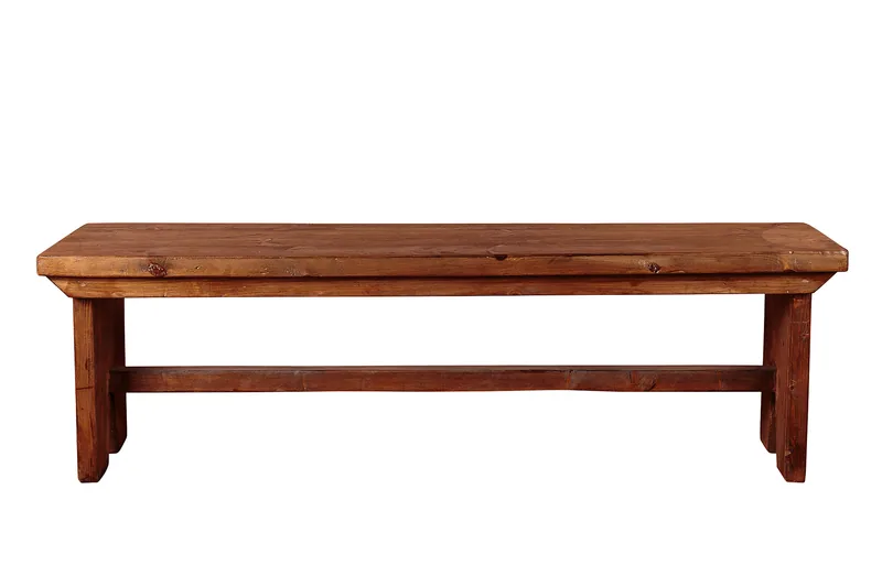 Long wooden bench with a thick plank seat and a horizontal support between its legs