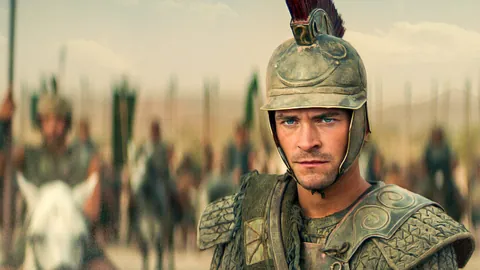 Official Netflix still of Buck Braithwaite as Alexander in armour, with soldiers behind him