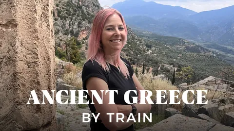 Official Ancient Greece by Train cover showing Alice Roberts beside an archaeological landscape