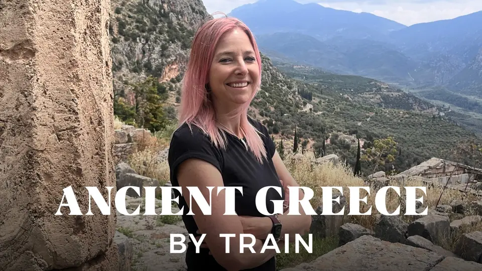 Official Ancient Greece by Train cover showing Alice Roberts beside an archaeological landscape