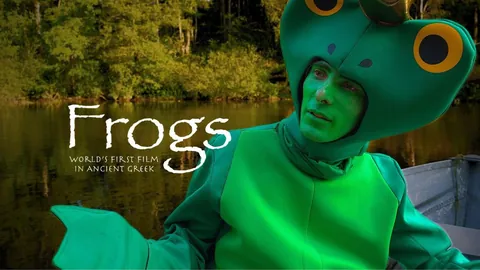 Official Frogs cover showing a performer in a green frog costume beside the film title.